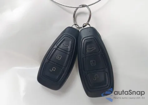 2012 Ford Focus Titanium из США, поврежденный, VIN 1FAHP3N26CL319695